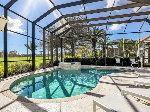 a view of swimming pool with a patio