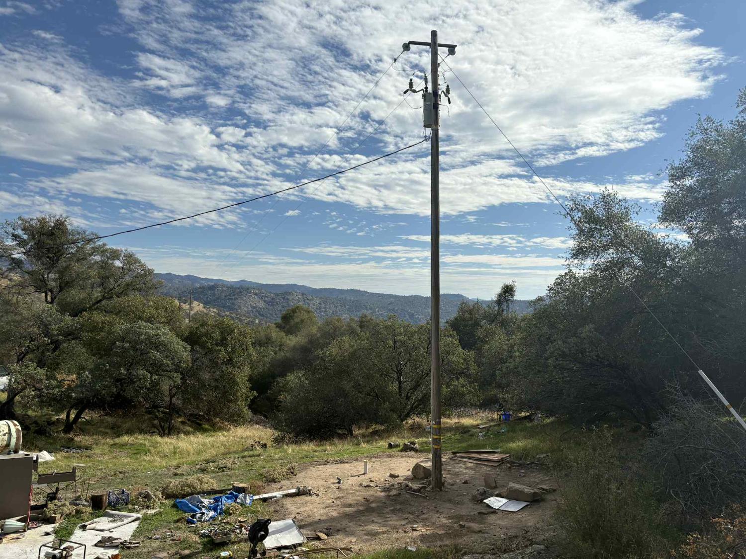 38699 Road 600 Raymond, CA 93653 - Photo 3 of 12 a view of a lake with a tree in the background