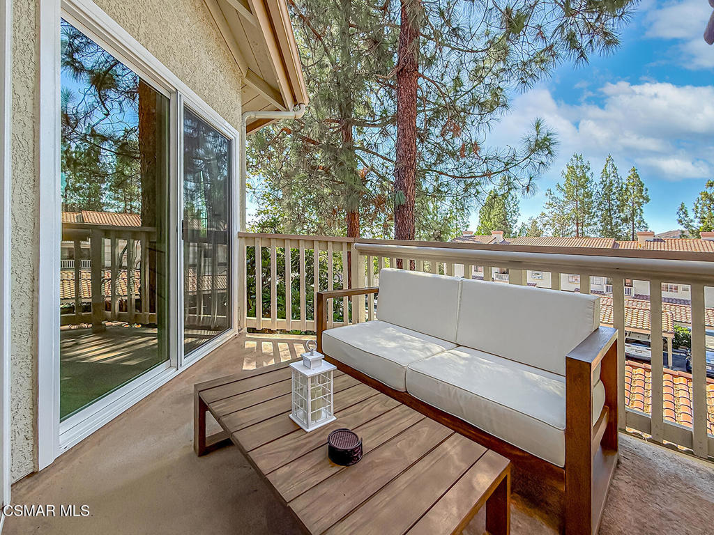 5837 Oak Bend Lane, Unit 302 Oak Park, CA 91377 - Photo 22 of 59 a view of a balcony with chairs