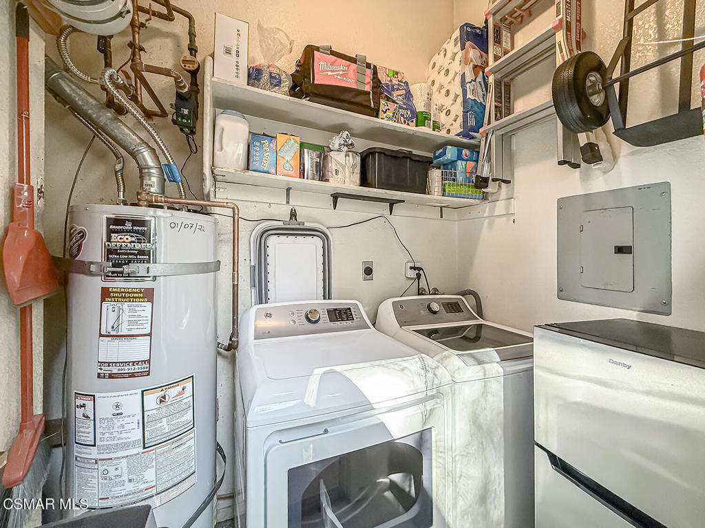 5837 Oak Bend Lane, Unit 302 Oak Park, CA 91377 - Photo 24 of 59 a utility room with multiple dryer and washer
