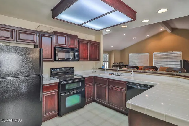 a view of a house with a small yard