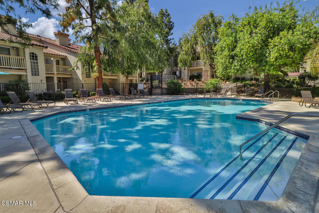 5837 Oak Bend Lane, Unit 302 Oak Park, CA 91377 - Photo 37 of 59 a view of a swimming pool with sitting area