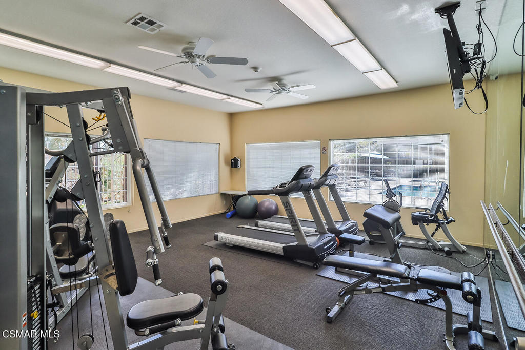 5837 Oak Bend Lane, Unit 302 Oak Park, CA 91377 - Photo 41 of 59 a view of a room with gym equipment