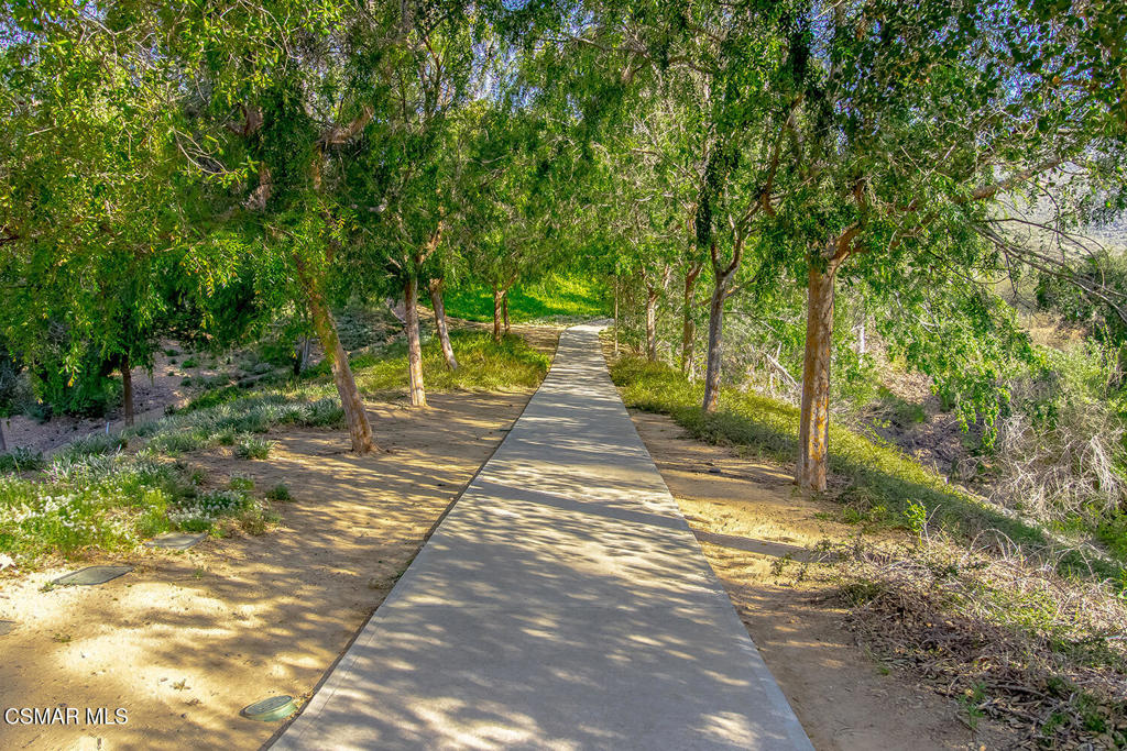 5837 Oak Bend Lane, Unit 302 Oak Park, CA 91377 - Photo 52 of 59 a view of yard with trees