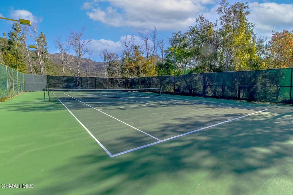5837 Oak Bend Lane, Unit 302 Oak Park, CA 91377 - Photo 56 of 59 a view of a tennis court