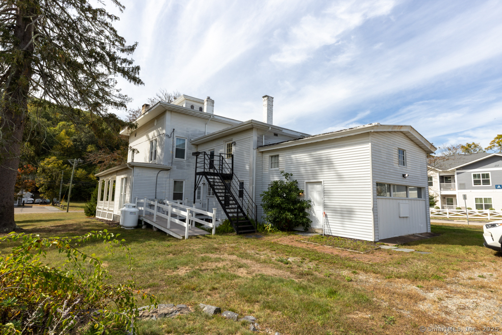 1572 Saybrook Road Haddam, CT 06438 - Photo 18 of 37 a front view of a house with garden