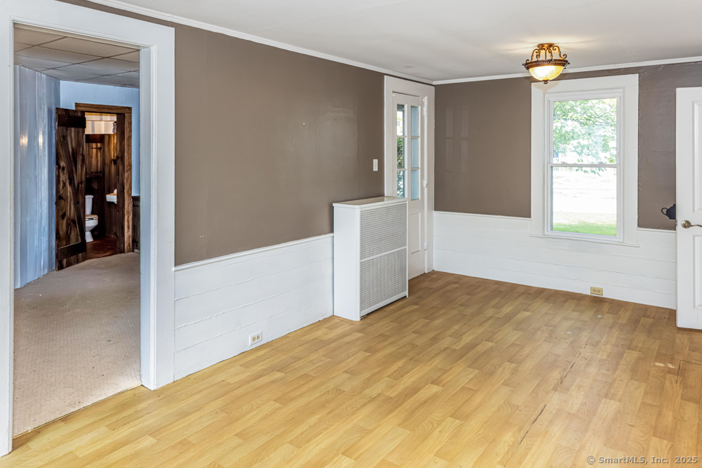 1572 Saybrook Road Haddam, CT 06438 - Photo 3 of 37 a view of empty room with wooden floor and fan