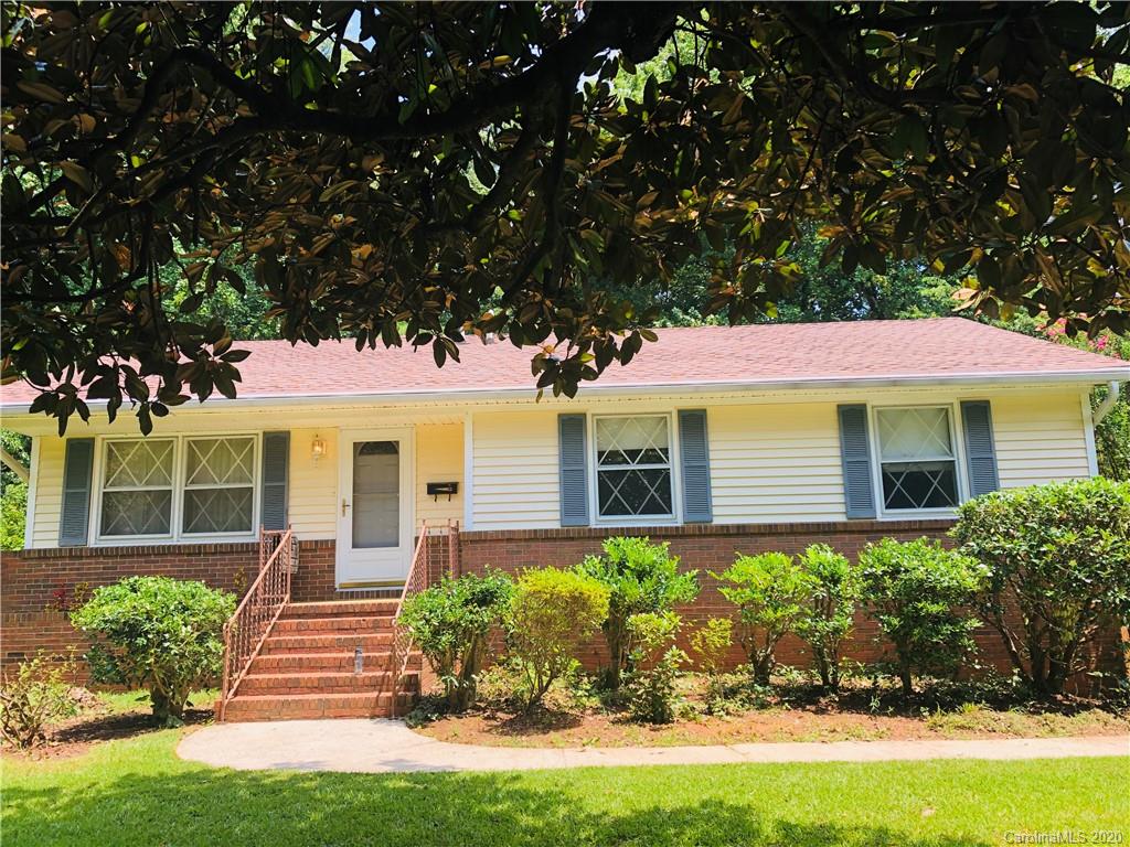 7501 Watercrest Road Charlotte, NC 28210 - Photo 1 of 17 a front view of a house with a yard