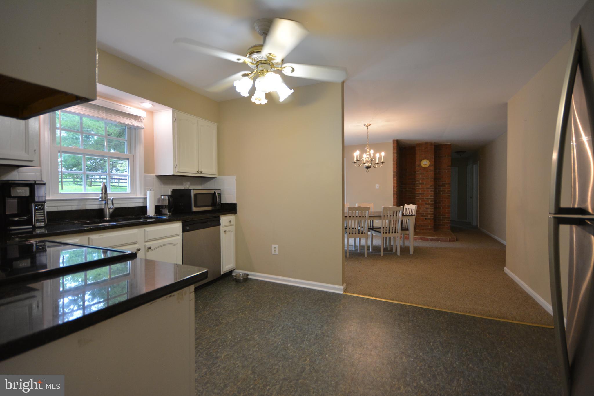 5534 Old Bust Head Road Broad Run, VA 20137 - Photo 18 of 32 Kitchen and separate dining area.