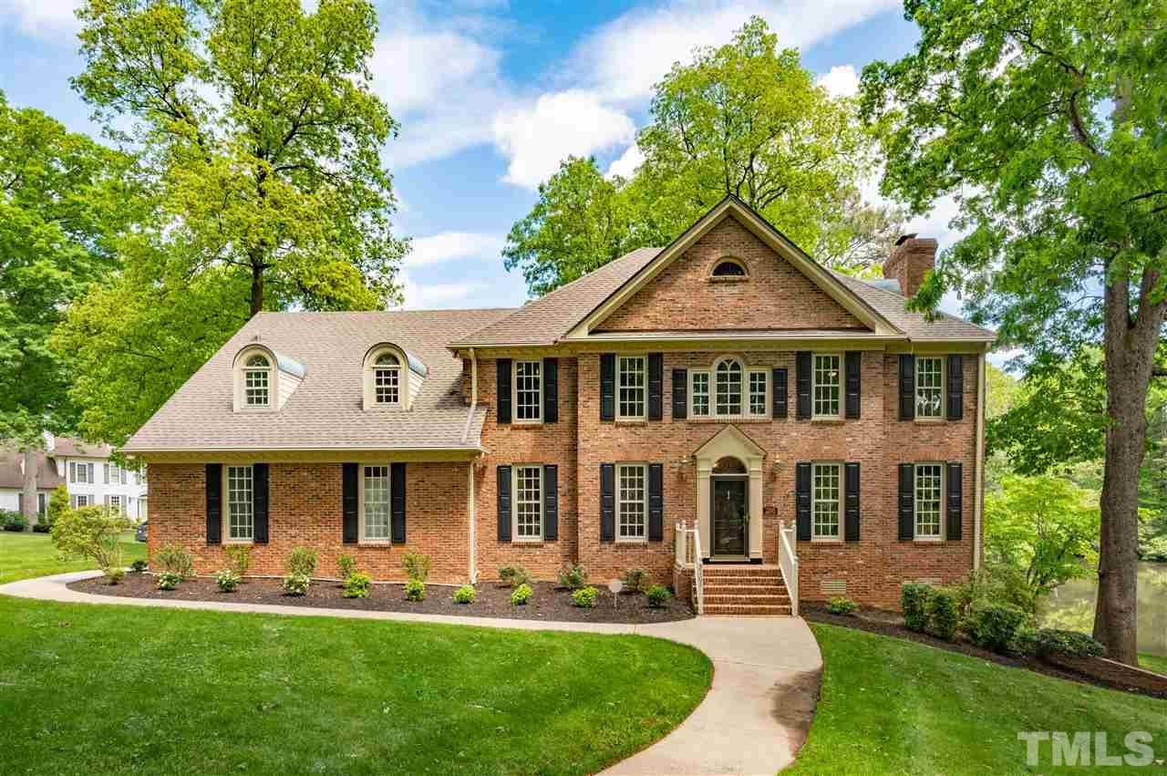 2105 Inverrary Court Raleigh, NC 27615 - Photo 1 of 29 a front view of a house with a yard