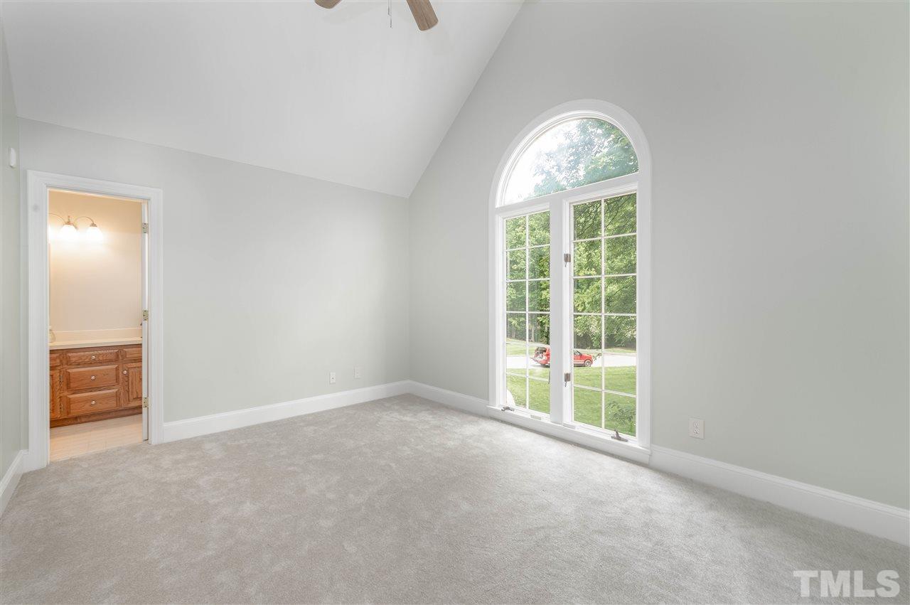 2105 Inverrary Court Raleigh, NC 27615 - Photo 18 of 29 an empty room with windows and closet