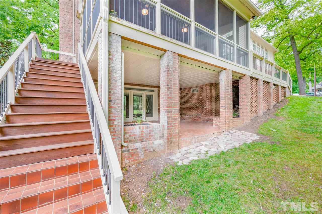 2105 Inverrary Court Raleigh, NC 27615 - Photo 26 of 29 a view of a house with backyard and porch