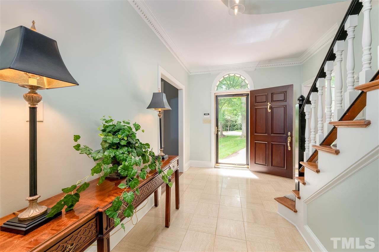 2105 Inverrary Court Raleigh, NC 27615 - Photo 4 of 29 a view of an entryway with a potted plant