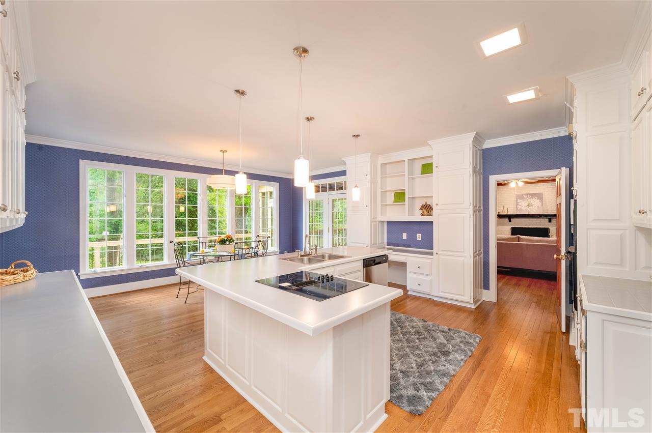 2105 Inverrary Court Raleigh, NC 27615 - Photo 7 of 29 a living room with furniture and a open kitchen view
