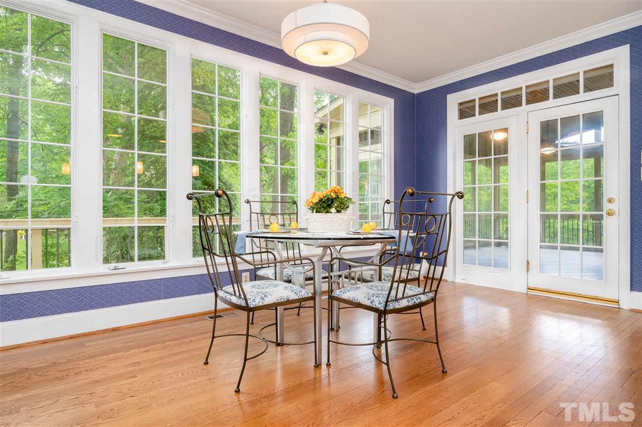 2105 Inverrary Court Raleigh, NC 27615 - Photo 8 of 29 a view of a dining room with furniture window and wooden floor