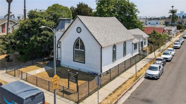 an aerial view of a house with swimming pool