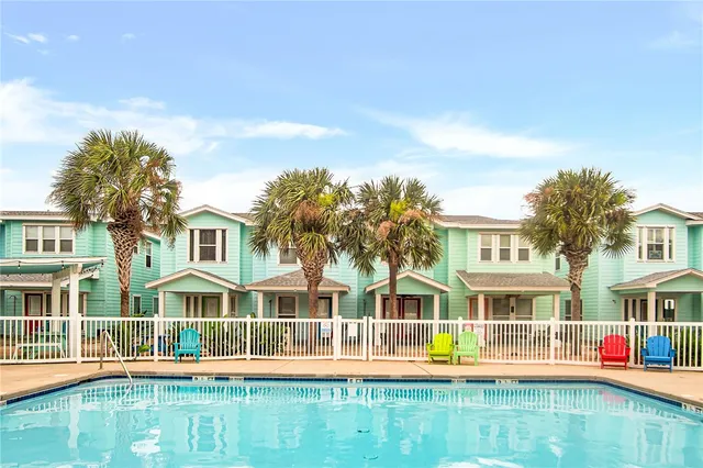 front view of a building with a yard