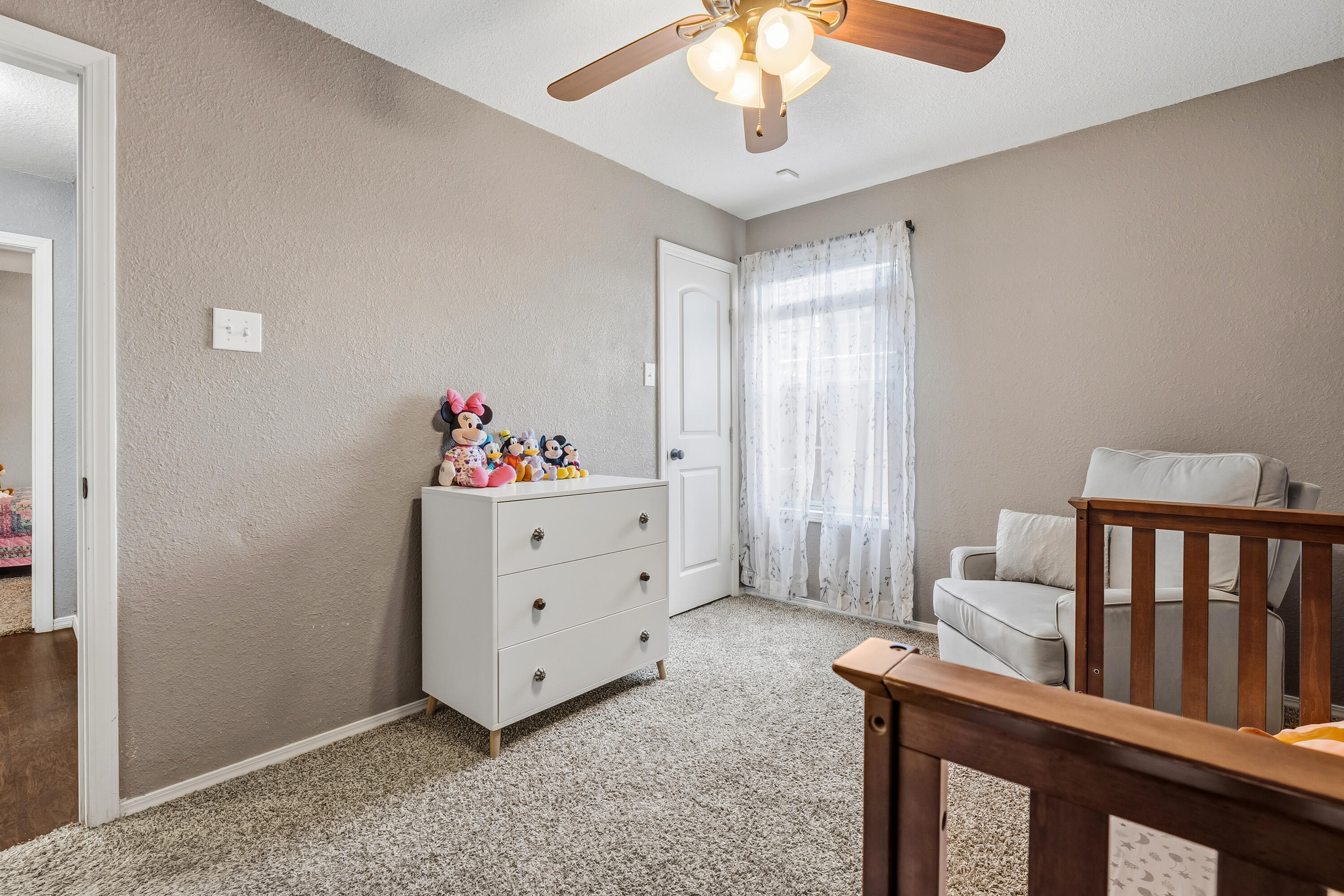 5736 2nd Place Lubbock, TX 79416 - Photo 20 of 26 a view of a workspace with furniture and a window