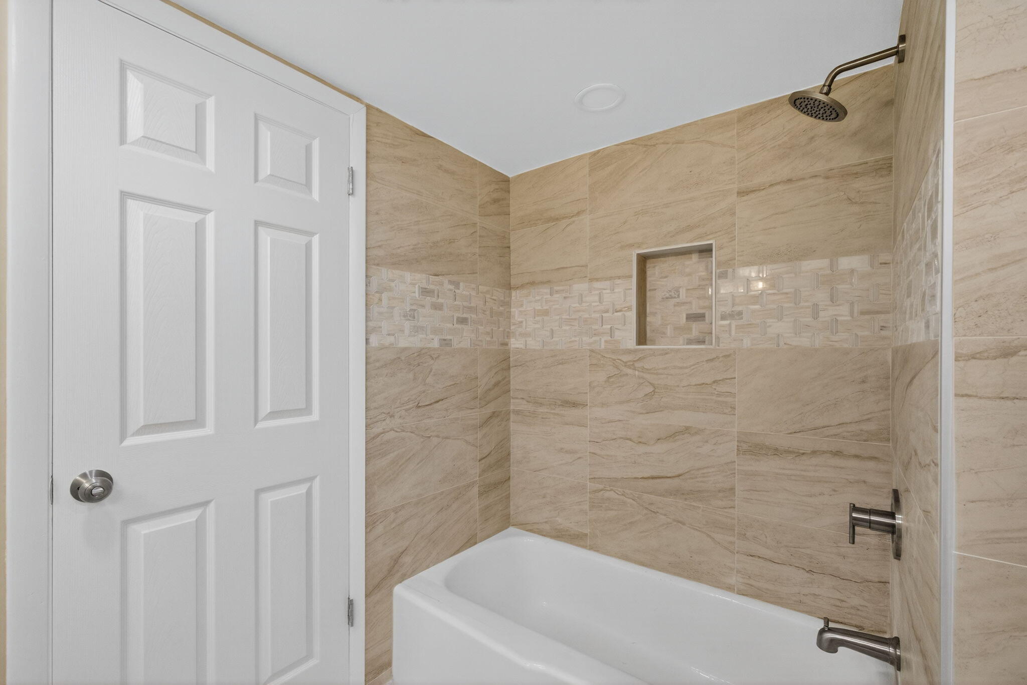 100 Waterway Road, Unit A304 Tequesta, FL 33469 - Photo 29 of 90 a bathroom with a white bath tub