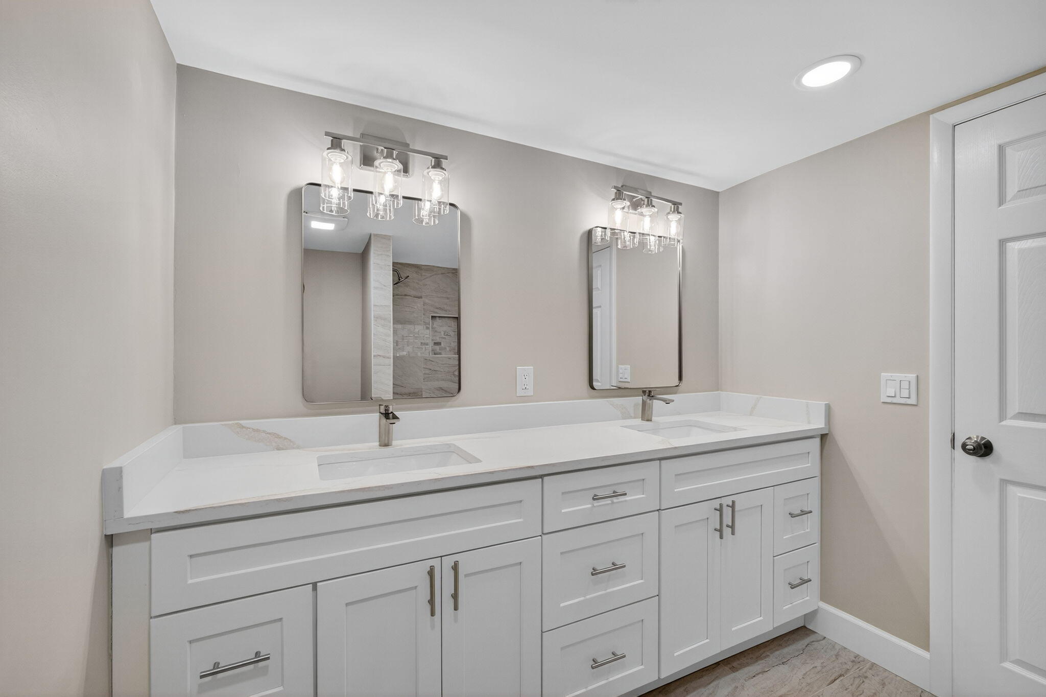 100 Waterway Road, Unit A304 Tequesta, FL 33469 - Photo 31 of 90 a bathroom with double sink and a mirror