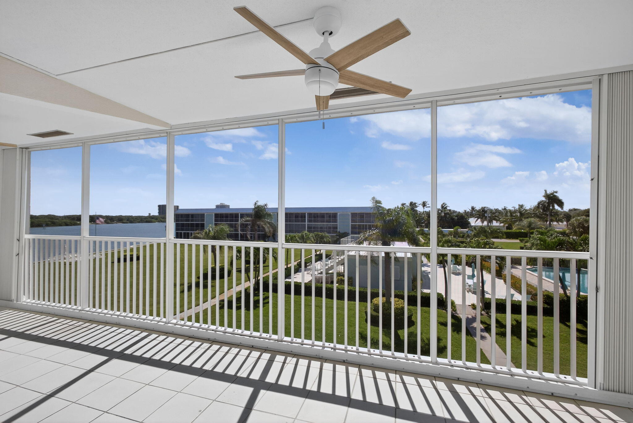 100 Waterway Road, Unit A304 Tequesta, FL 33469 - Photo 43 of 90 a view of a balcony with floor to ceiling window in wooden floor