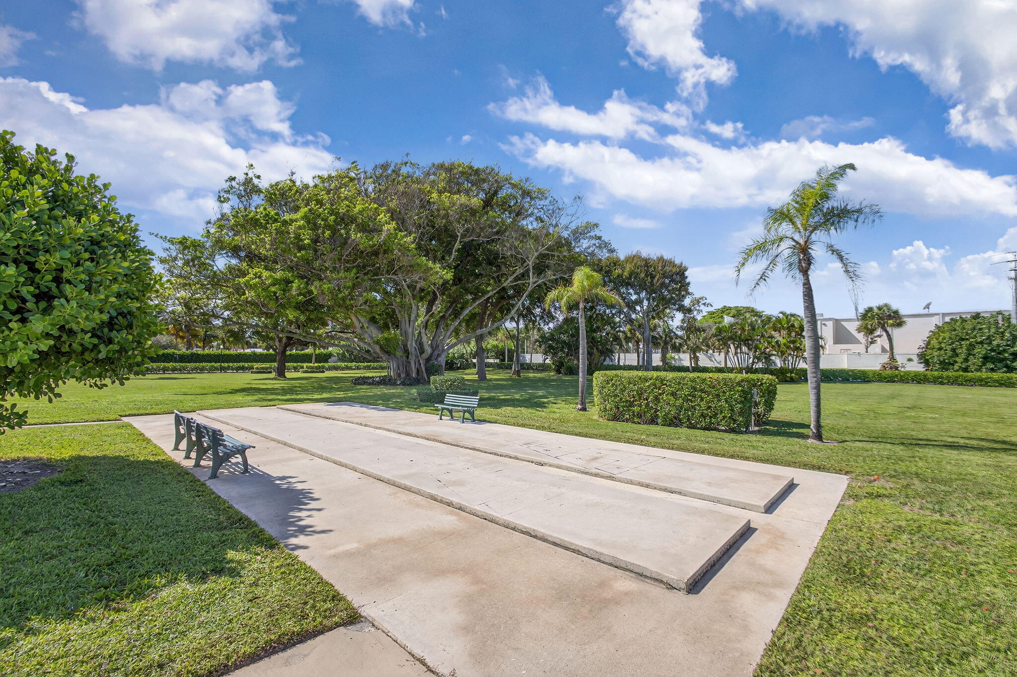 100 Waterway Road, Unit A304 Tequesta, FL 33469 - Photo 51 of 90 a view of a park and trees in the background