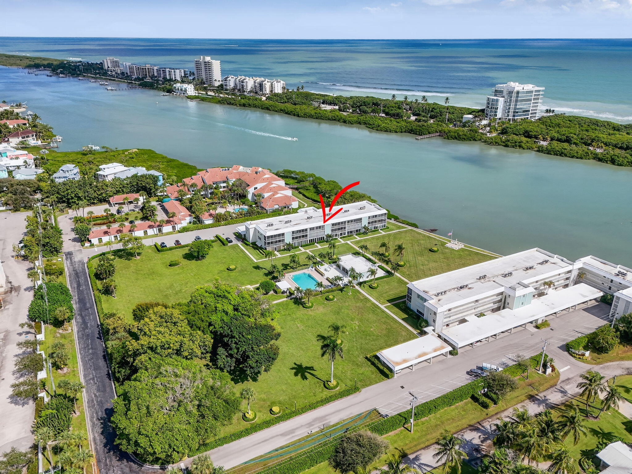 100 Waterway Road, Unit A304 Tequesta, FL 33469 - Photo 77 of 90 an aerial view of a houses with outdoor space