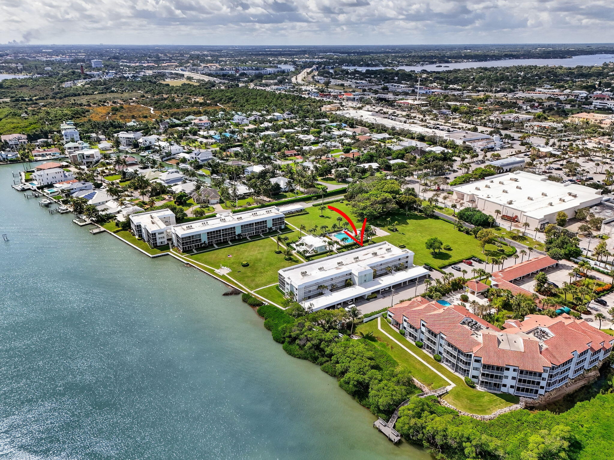 100 Waterway Road, Unit A304 Tequesta, FL 33469 - Photo 85 of 90 an aerial view of a house with a garden