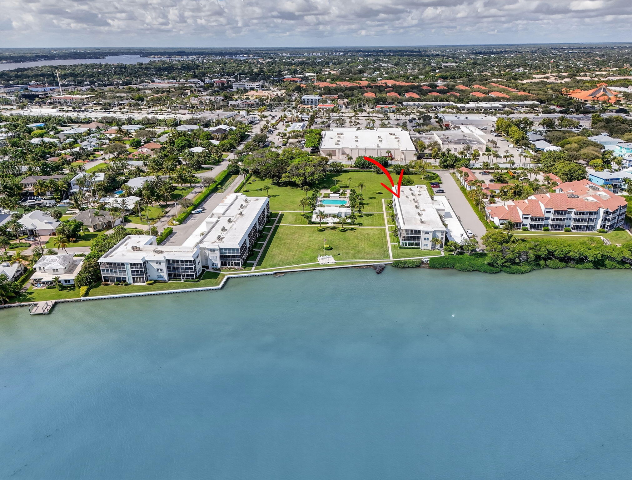 100 Waterway Road, Unit A304 Tequesta, FL 33469 - Photo 87 of 90 an aerial view of a house with a garden and lake view