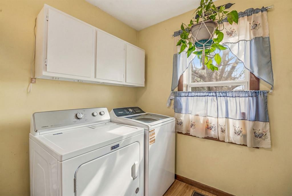 941 Farm To Market 1287 Graham, TX 76450 - Photo 16 of 39 a utility room with dryer and washer