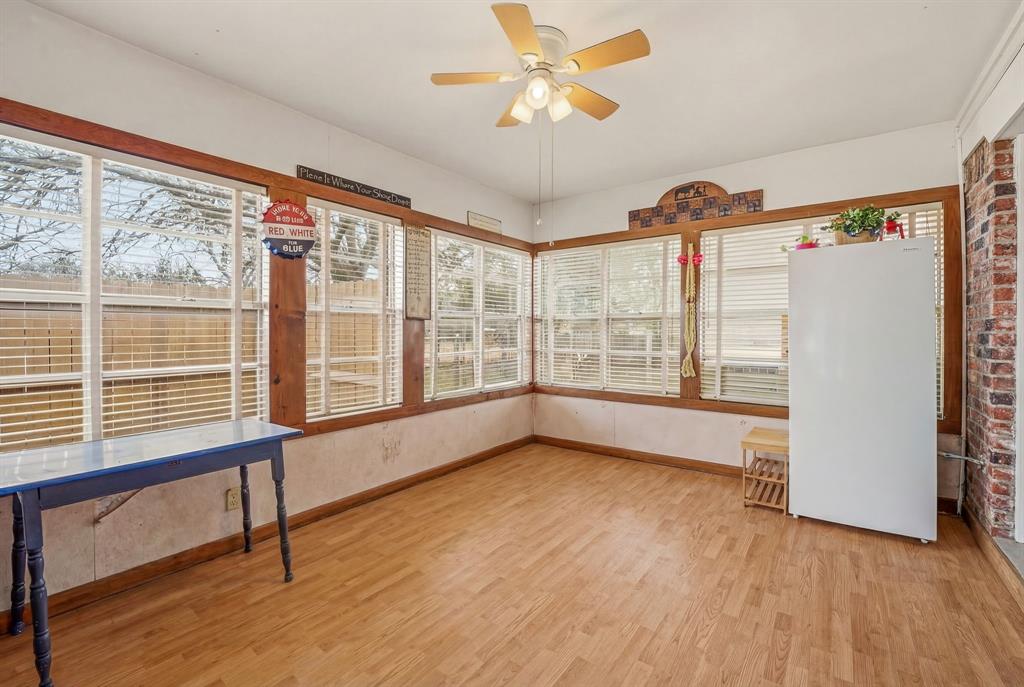 941 Farm To Market 1287 Graham, TX 76450 - Photo 17 of 39 a view of an empty room with a window and wooden floor