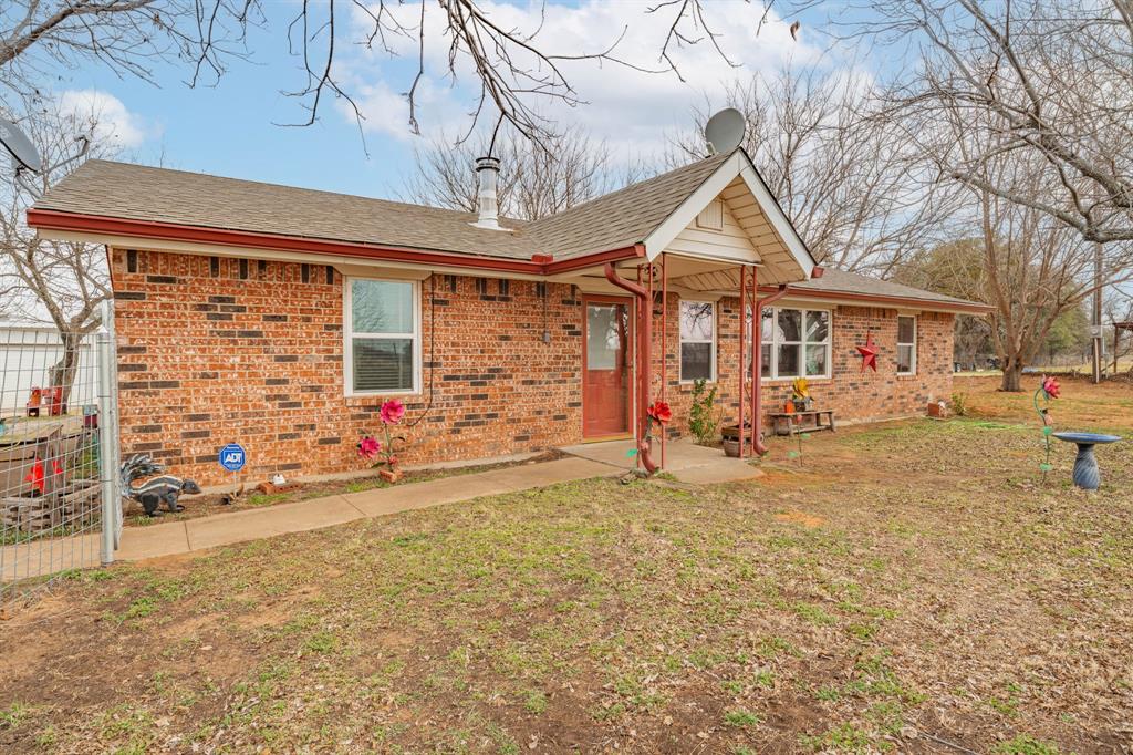 941 Farm To Market 1287 Graham, TX 76450 - Photo 31 of 39 a view of a house with a patio
