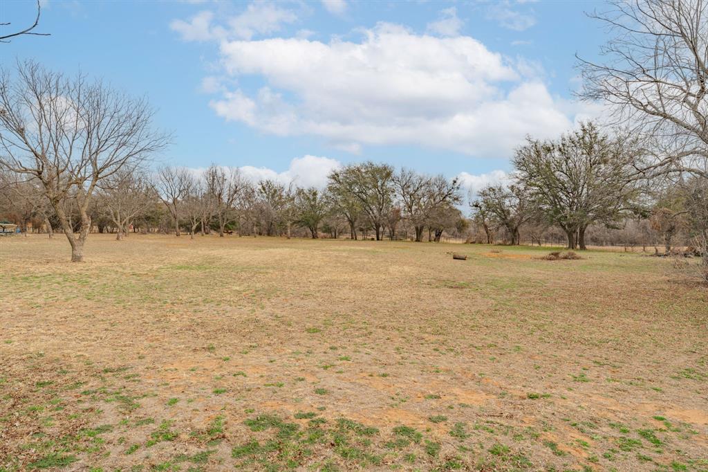 941 Farm To Market 1287 Graham, TX 76450 - Photo 32 of 39 a view of dirt field with trees