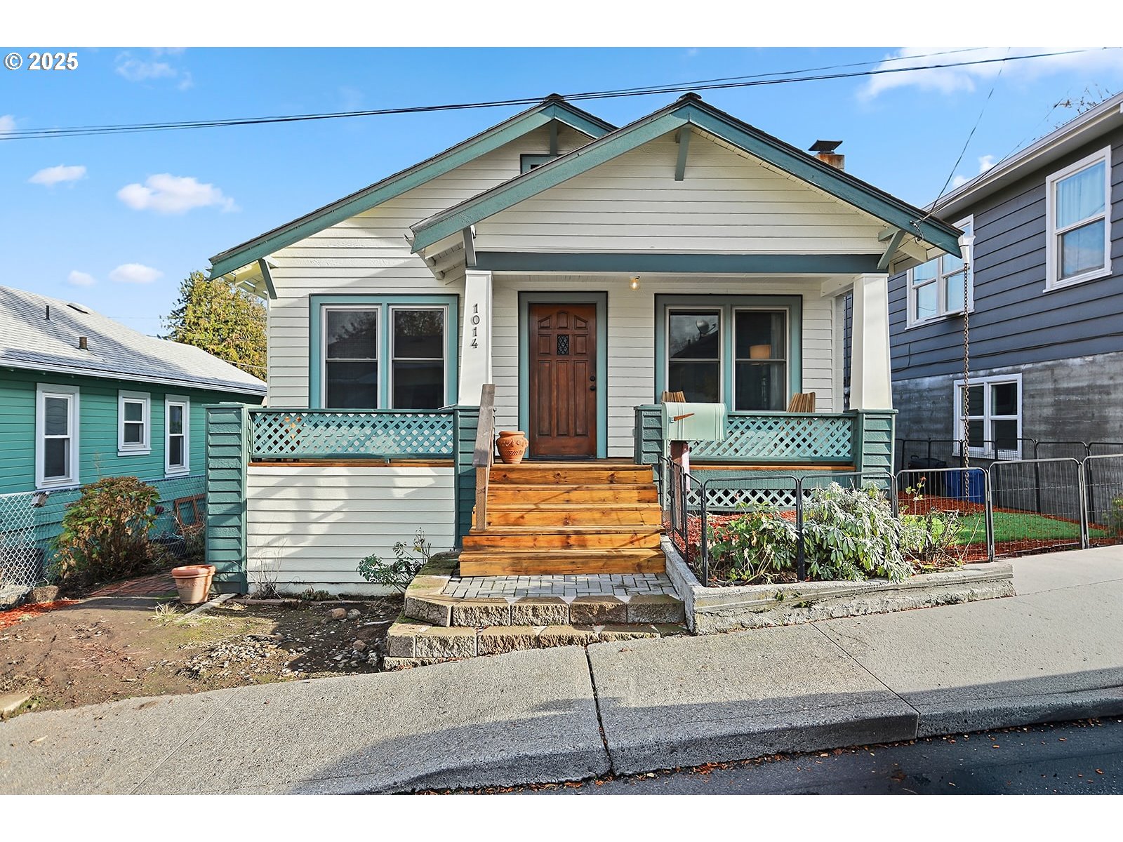 1014 Laughlin Street The Dalles, OR 97058 - Photo 1 of 36 a front view of a house with garden
