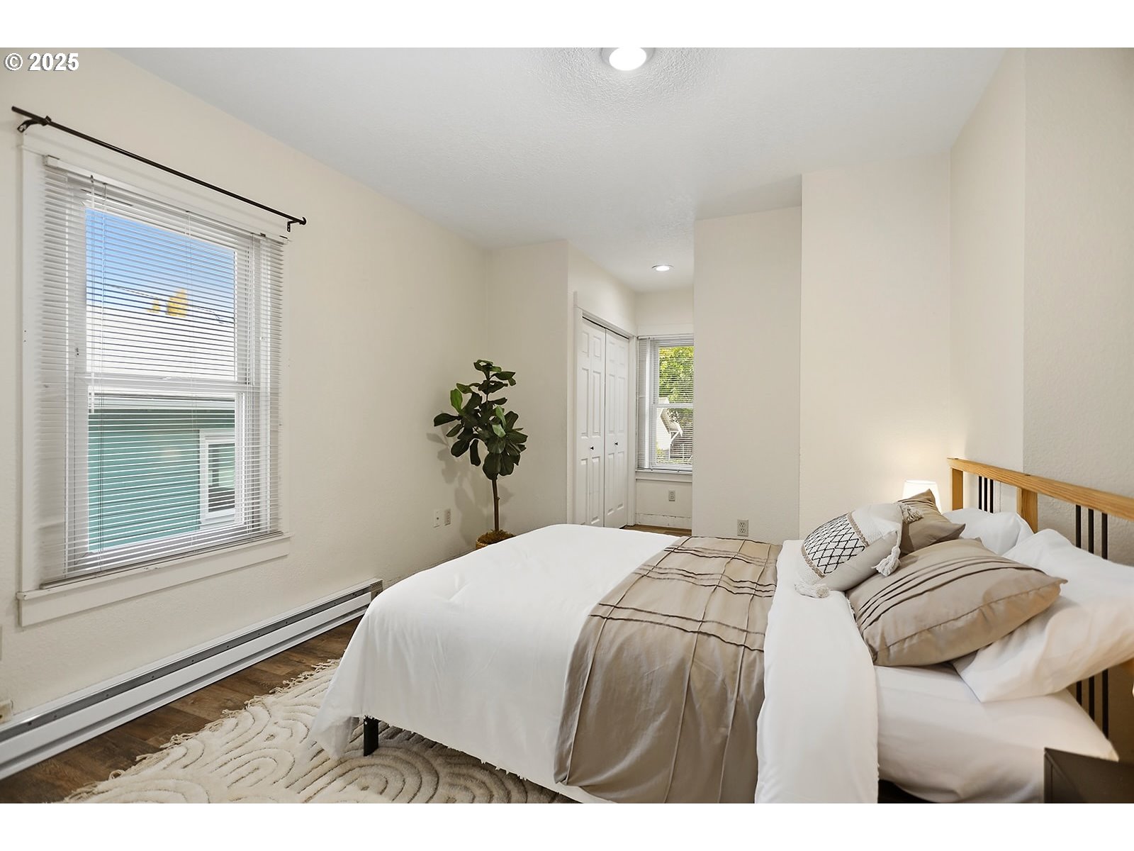 1014 Laughlin Street The Dalles, OR 97058 - Photo 15 of 36 a bedroom with a bed and a window