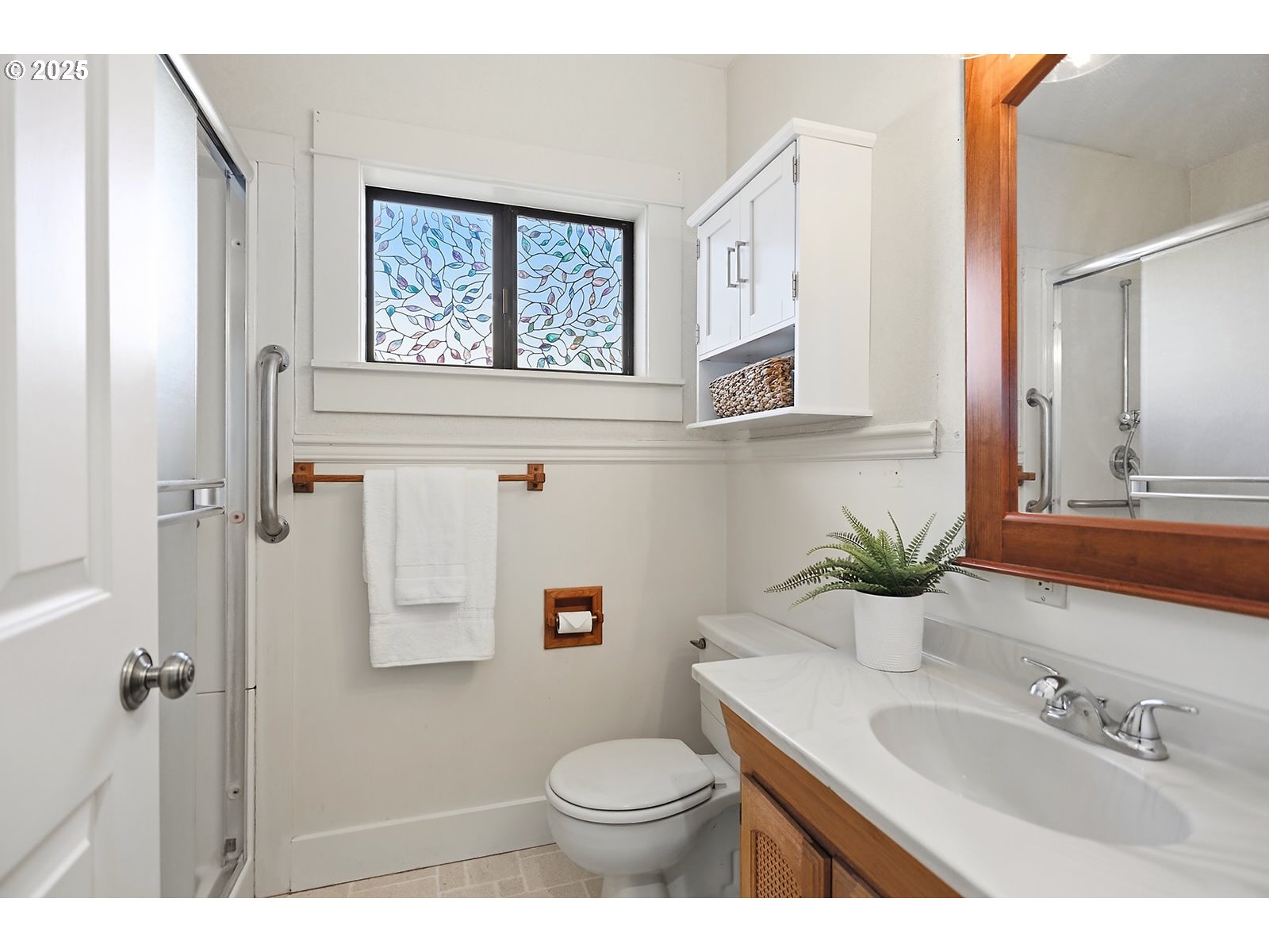 1014 Laughlin Street The Dalles, OR 97058 - Photo 21 of 36 a bathroom with a sink toilet and shower