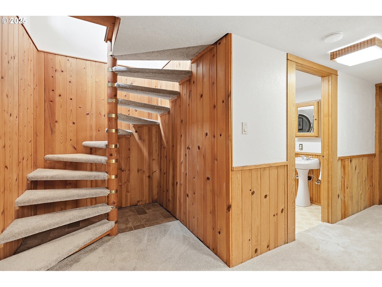1014 Laughlin Street The Dalles, OR 97058 - Photo 23 of 36 a view of a bathroom with staircase and white walls
