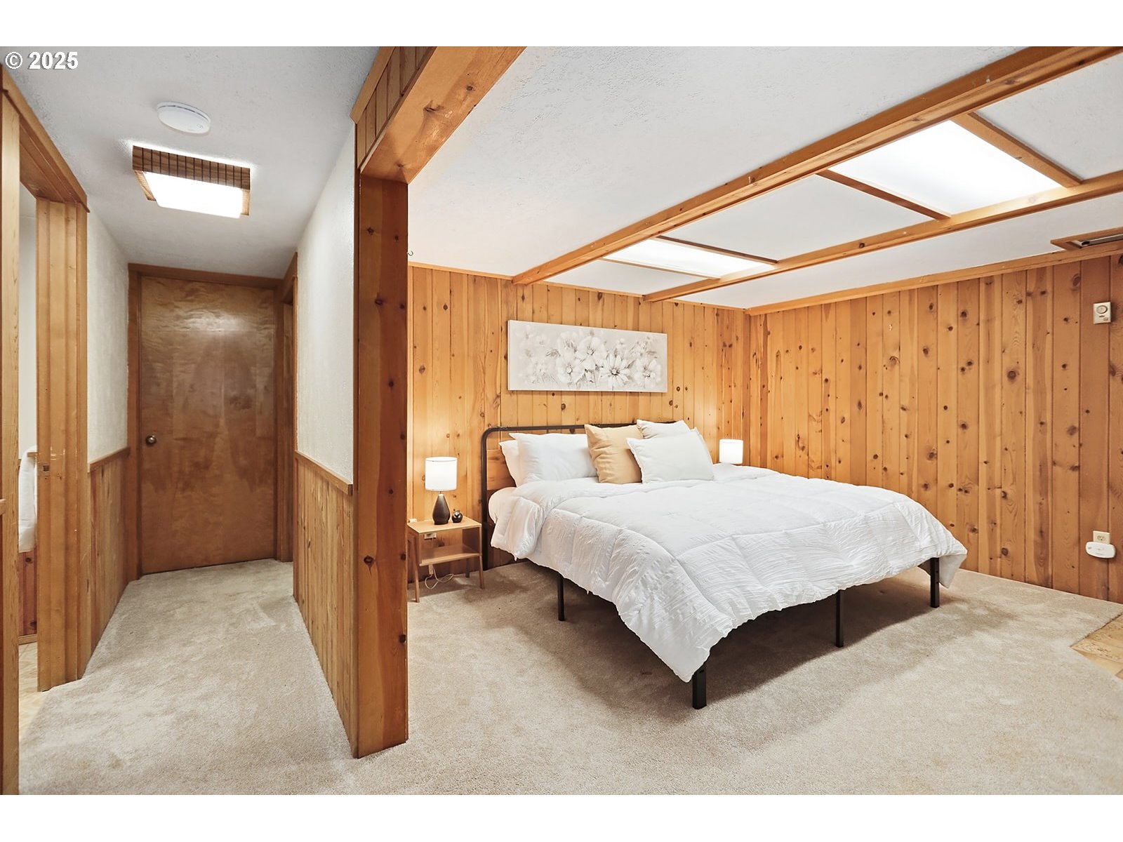 1014 Laughlin Street The Dalles, OR 97058 - Photo 24 of 36 a bedroom with a bed and a large mirror