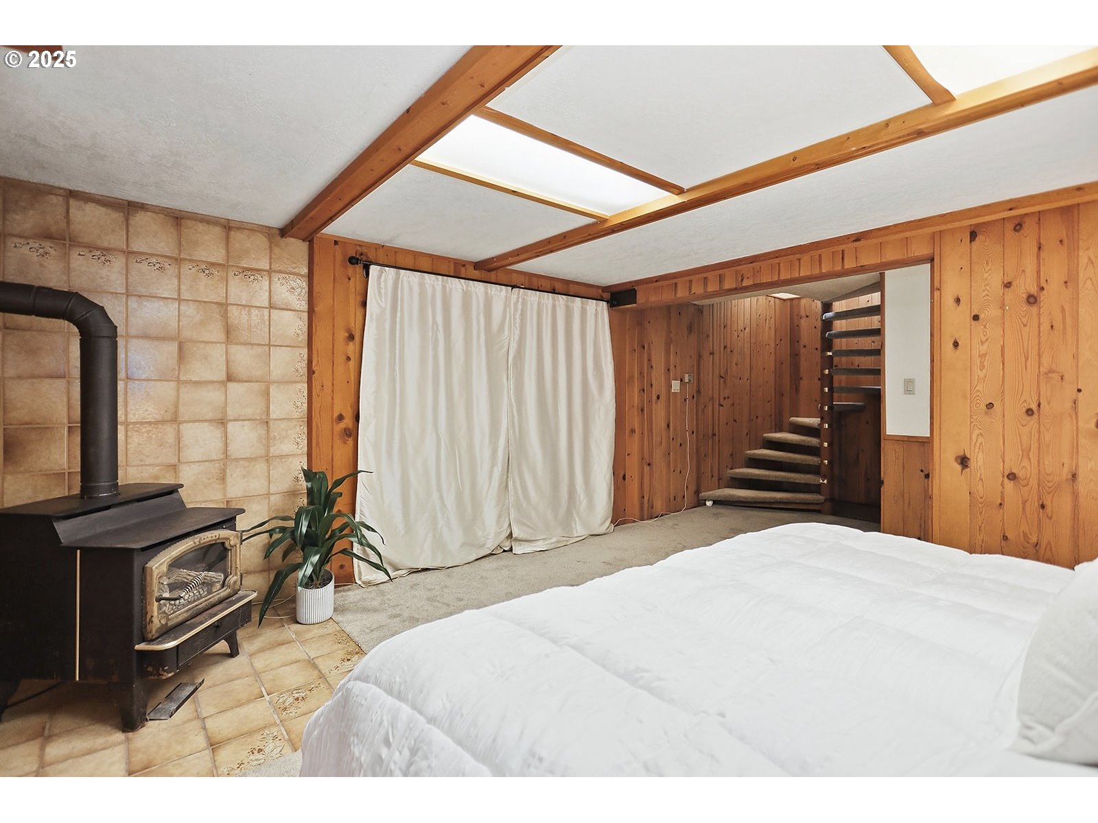 1014 Laughlin Street The Dalles, OR 97058 - Photo 26 of 36 a bed room with a bed and a television