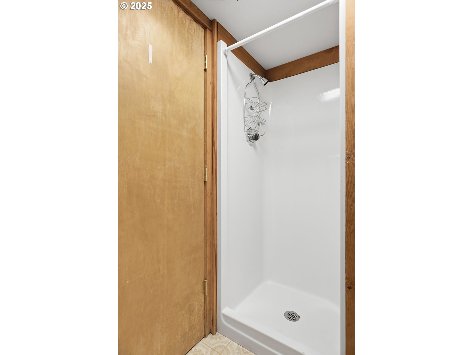 1014 Laughlin Street The Dalles, OR 97058 - Photo 28 of 36 a bathroom with a glass shower door