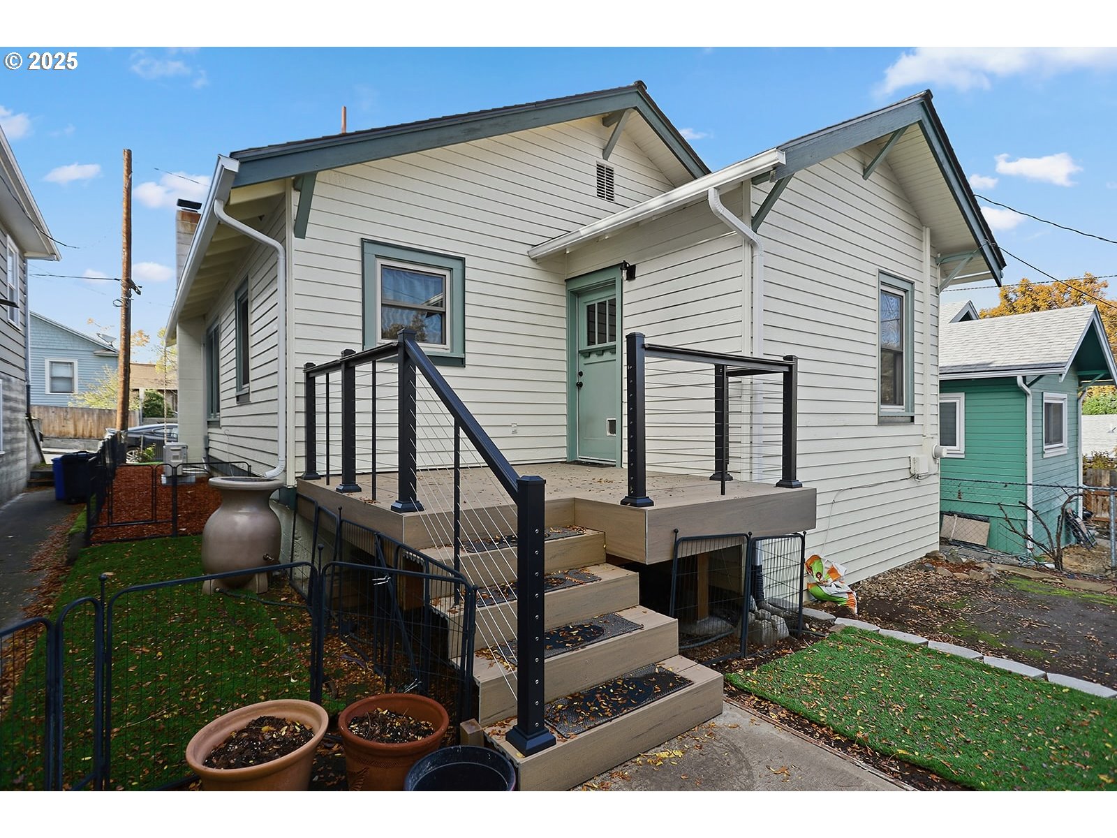 1014 Laughlin Street The Dalles, OR 97058 - Photo 34 of 36 a view of a house with backyard and porch