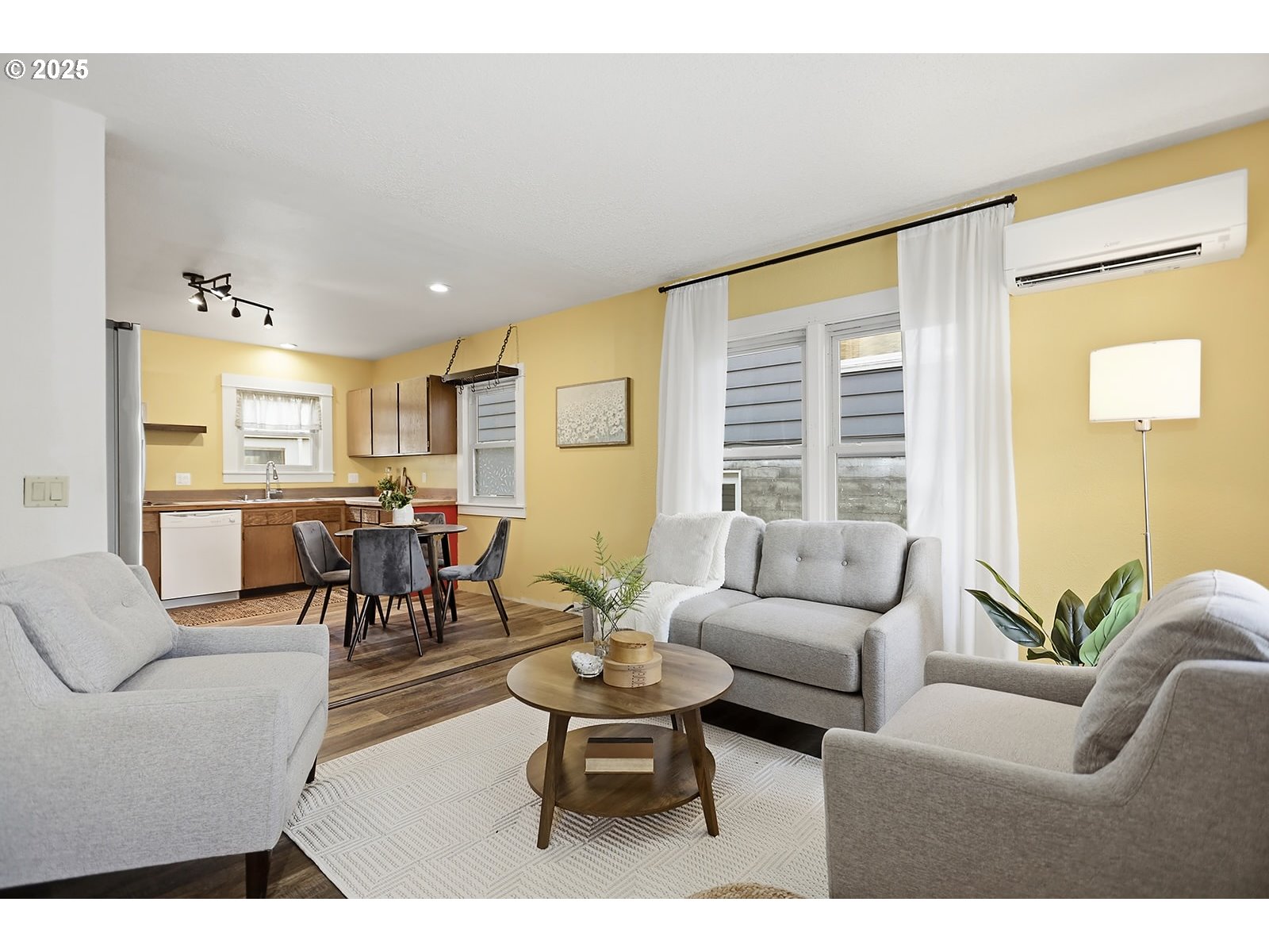 1014 Laughlin Street The Dalles, OR 97058 - Photo 8 of 36 a living room with furniture and a large window