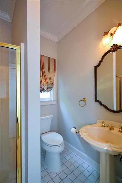 40 Waverly Lane Winder, GA 30680 - Photo 21 of 40 a bathroom with a sink and a mirror