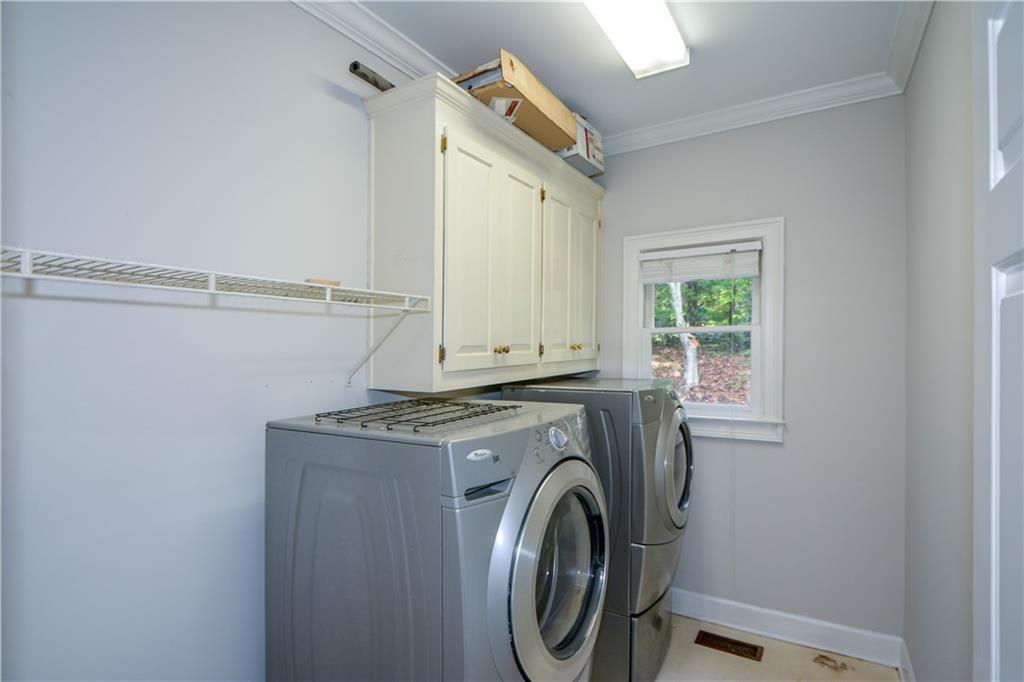 40 Waverly Lane Winder, GA 30680 - Photo 22 of 40 a utility room with dryer and washer