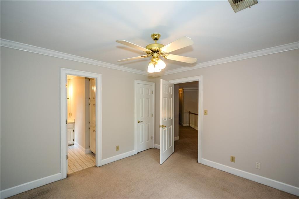 40 Waverly Lane Winder, GA 30680 - Photo 30 of 40 an empty room with closet and a ceiling fan