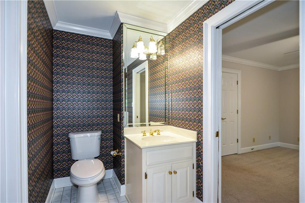 40 Waverly Lane Winder, GA 30680 - Photo 35 of 40 a bathroom with a sink and a mirror