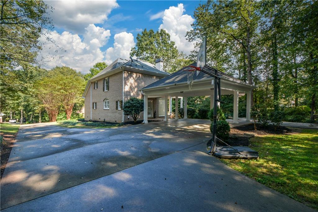 40 Waverly Lane Winder, GA 30680 - Photo 38 of 40 a view of a house with backyard and sitting area