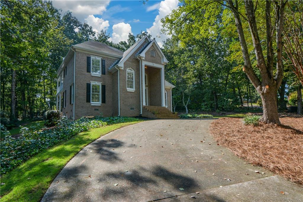 40 Waverly Lane Winder, GA 30680 - Photo 4 of 40 a front view of a house with a yard and a tree