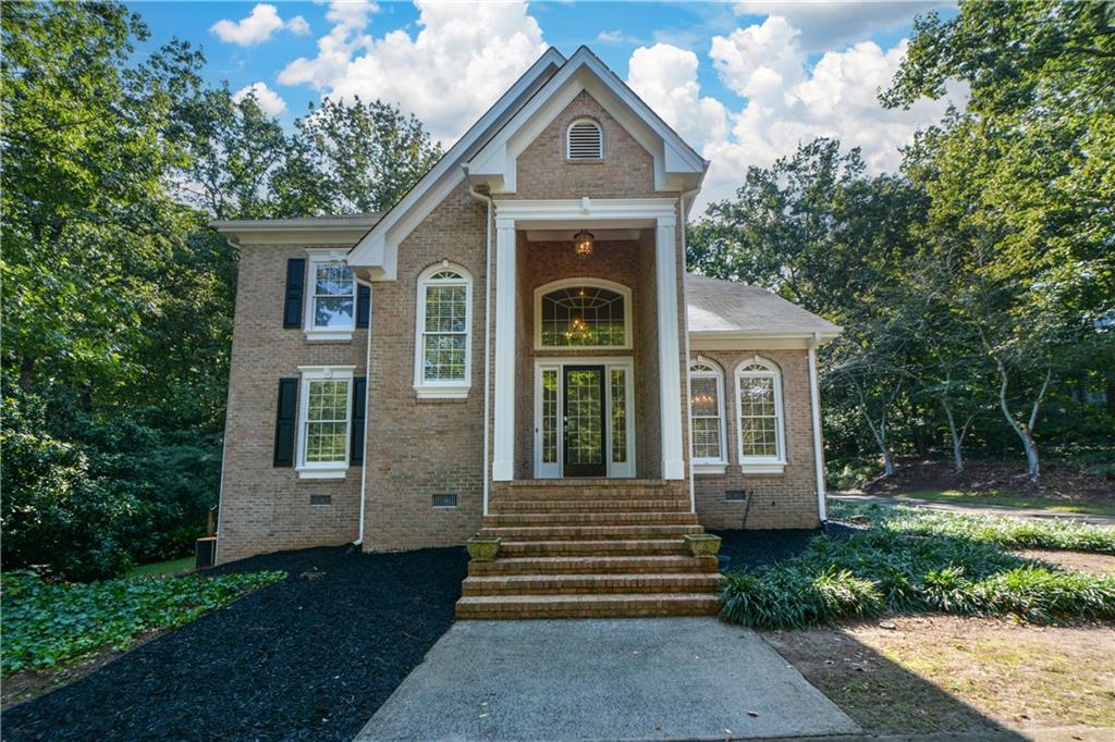 40 Waverly Lane Winder, GA 30680 - Photo 5 of 40 a front view of a house with a garden