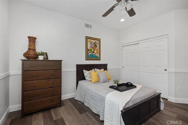 a view of a house with swimming pool and sitting area
